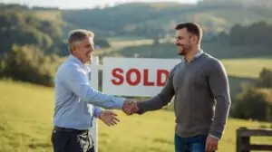 sell inherited vacant land handshake